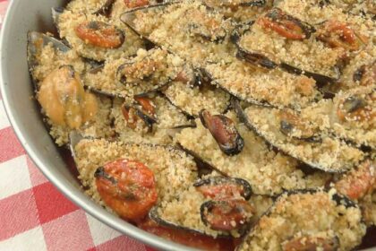 Cozze con patate e cous cous al forno