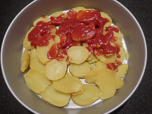 patate e pomodoro in teglia