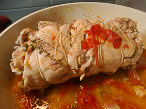 rollè di coniglio in cottura