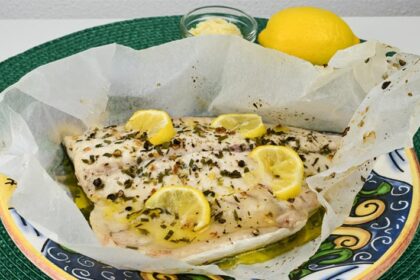 Ricciola al cartoccio con limone ed erbe aromatiche