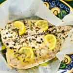 Ricciola al cartoccio con limone ed erbe aromatiche