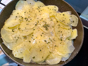spigola con patate in padella