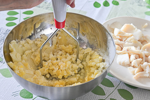 schiacciare le patate